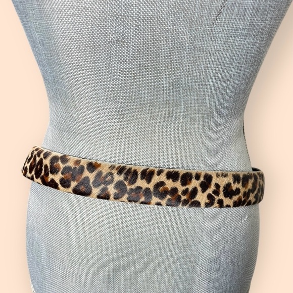 Vintage Sandy Duftler Designs belt, featuring a leopard print on the outside L